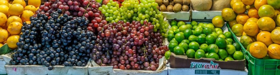 green and red apples on blue plastic crate